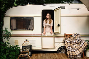 woman in travel travel camper trailer campervan recreational vehicle rvngo online RV rentals